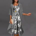 Stylish Three-Quarter Sleeve Dress Featuring an Elegant Floral Pattern