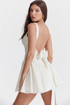 Celestial Elegance: The White Bow Dress